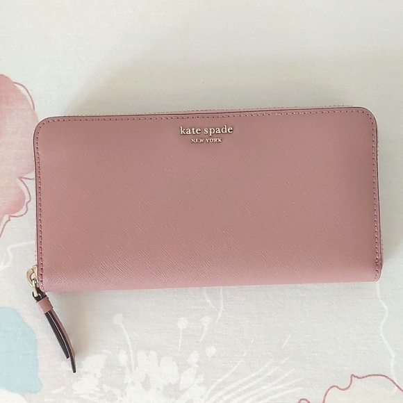 kate spade Handbags - NWOT Kate spade soft pink leather long zip around wallet